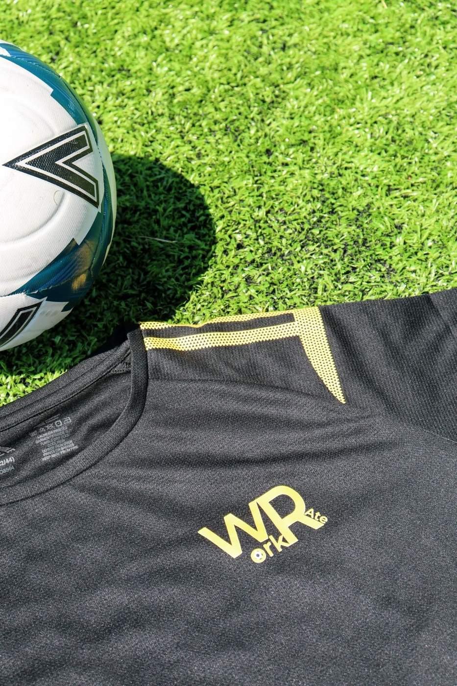 WorkRate football shirt and ball on the pitch